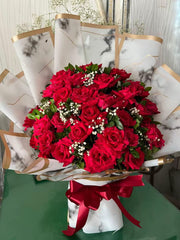 White Roses in Burgundy Wrap